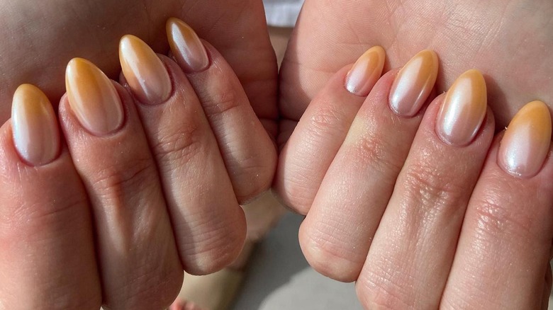 Instagram user showing apricot ombré manicure