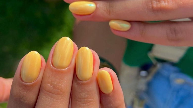 Instagram user showing apricot glazed manicure