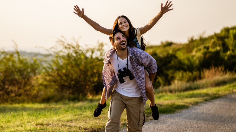 Happy couple hiking 