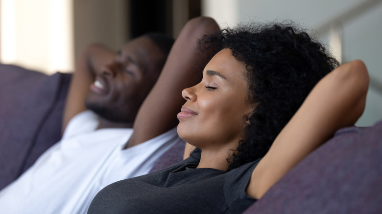 Couple relaxing on the couch 