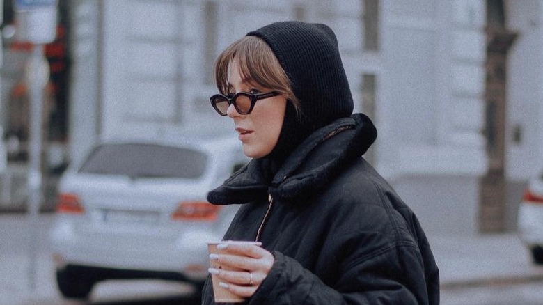 woman wearing a black balaclava