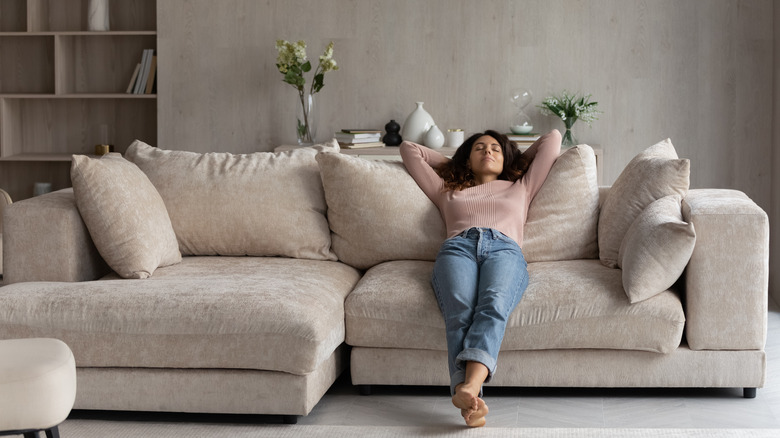 Woman sleeping on couch