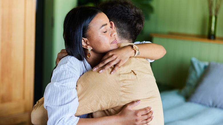 two friends hugging