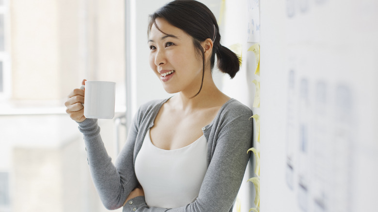 woman drinking coffee