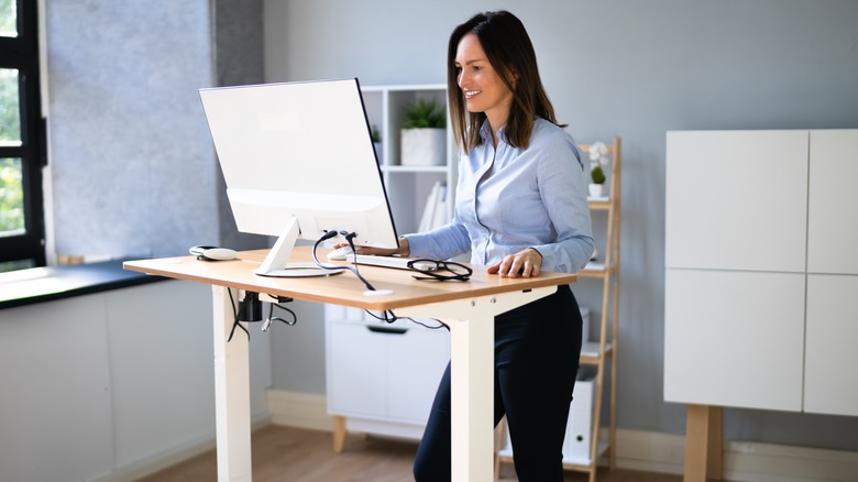 Woman using standing desk