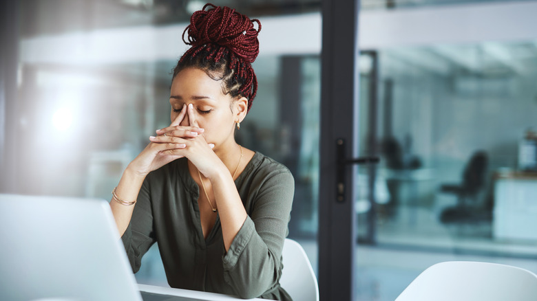 Stressed woman at work