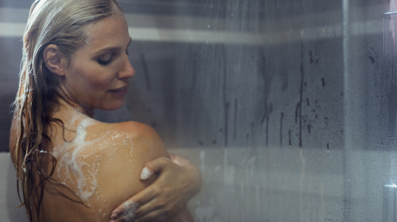 woman using body wash