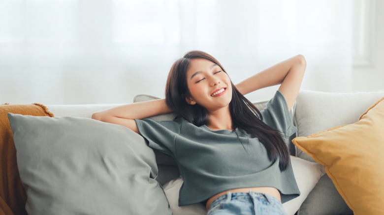 relaxed woman on couch