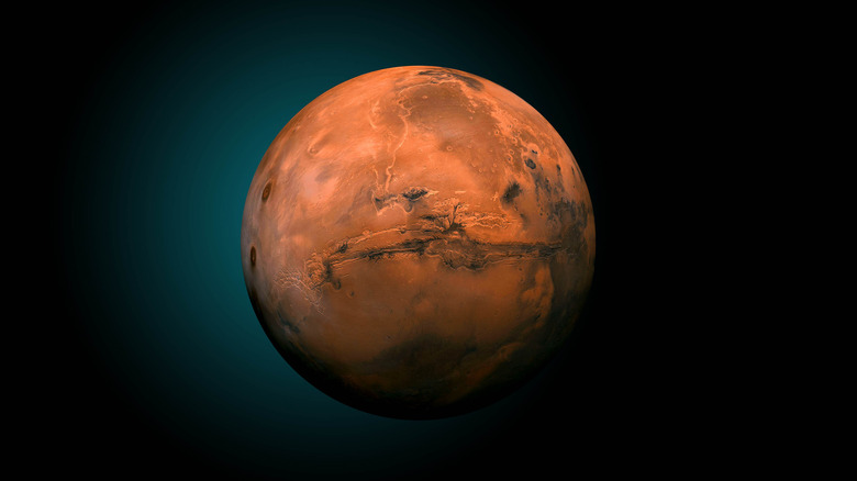 Mars surrounded by dark sky