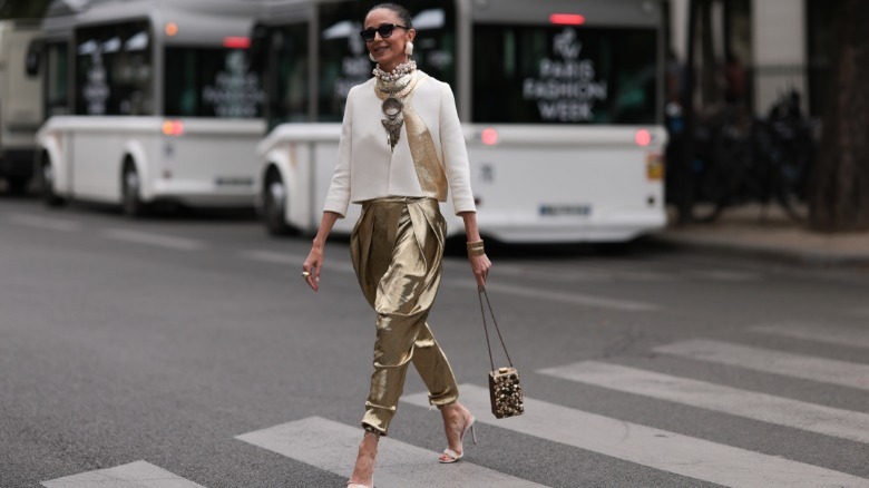 Woman wearing gold pants