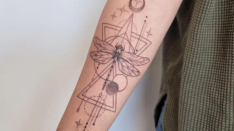 geometric dragonfly tattoo