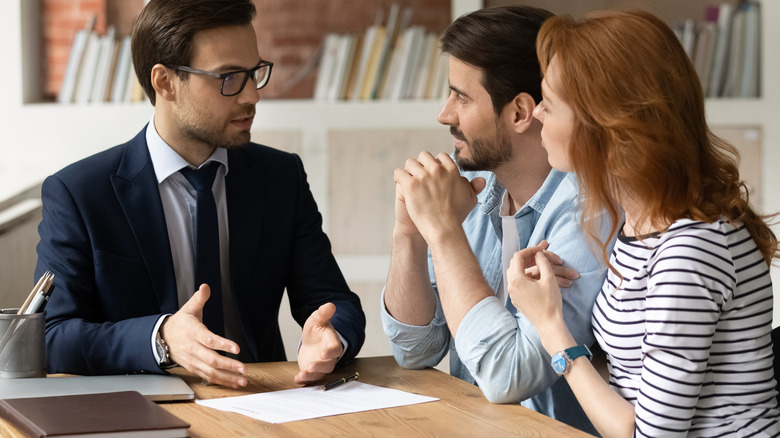 Woman speaking to a financial advisor