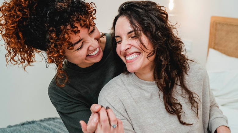 Couple smiling at each other