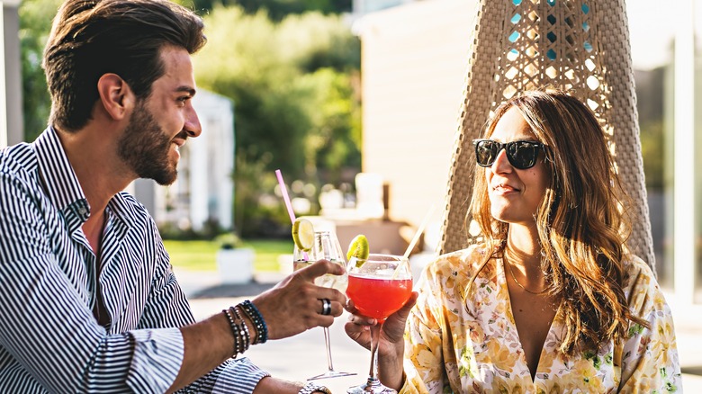 couple enjoying cocktails