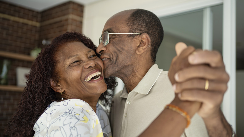 couple dancing at home