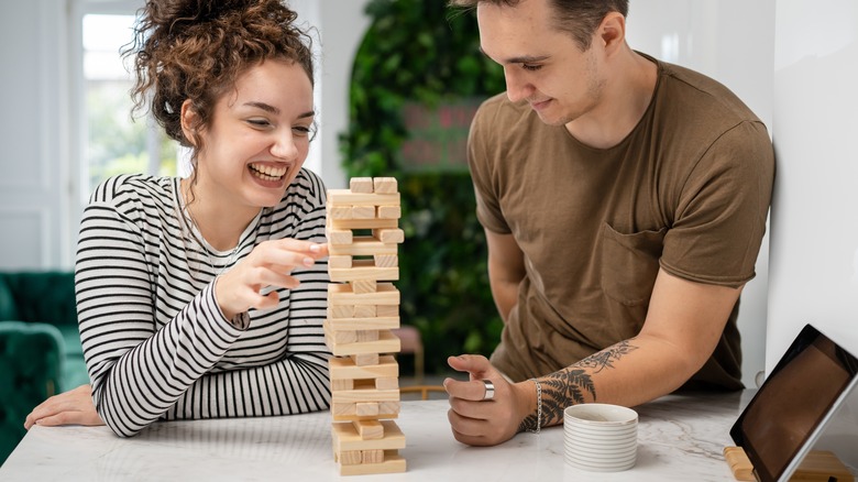 couple playing Jenga