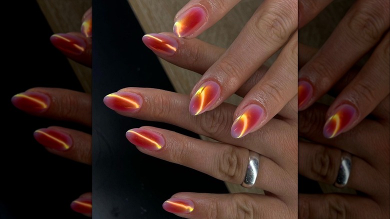 Orange hue aurora nails