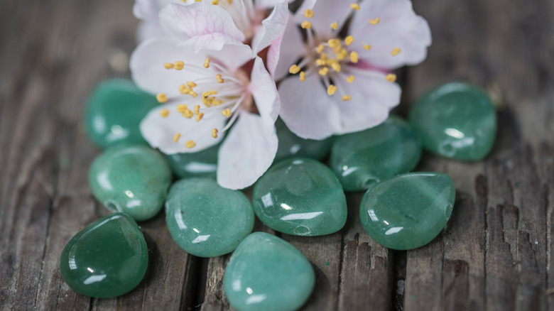 Several aventurine crystals with flowers