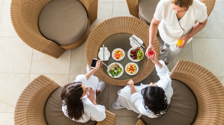 women eating fruits at spa