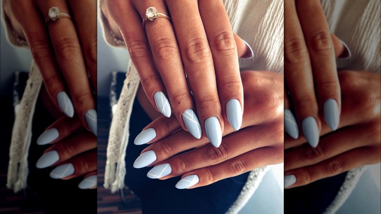 Baby blue nails with white lines
