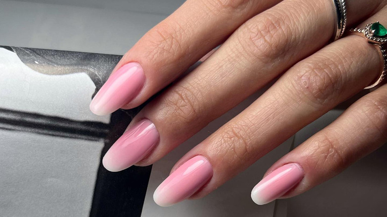 Baby boomer nails with a medium pink