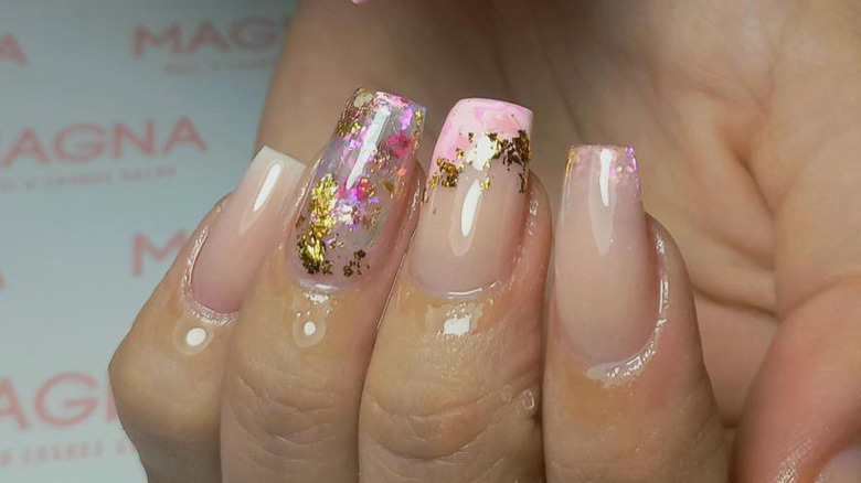 Baby boomer nails with gold leaf design