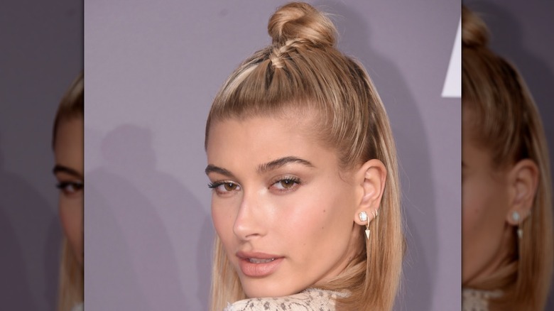 Hailey Bieber wearing a baby braid