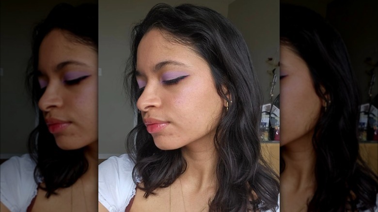 A woman with lavender eyeshadow