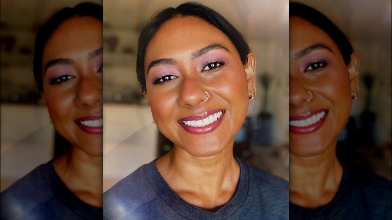 A woman with pink makeup