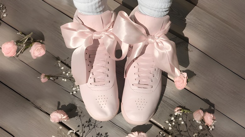 Pink sneakers with satin ribbons