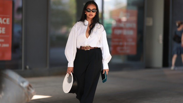 Woman wearing puffy button-down shirt