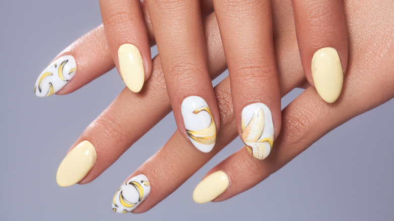 Pastel manicure with banana designs