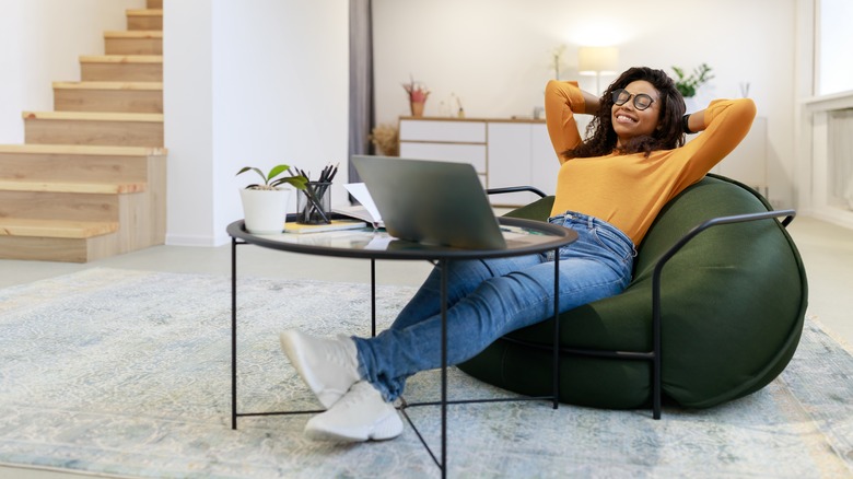 person relaxing while working