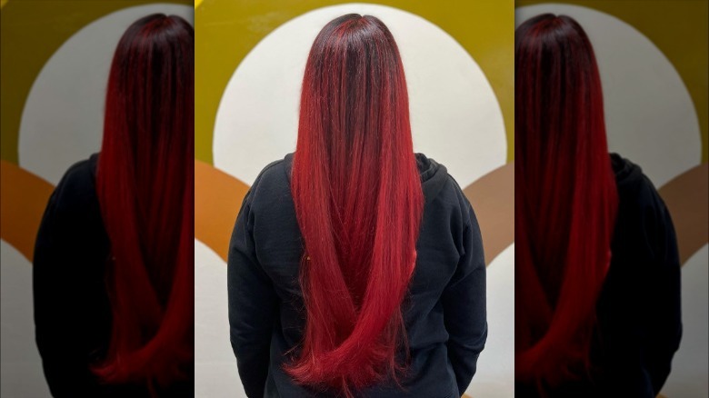 A woman with a lot of red highlights