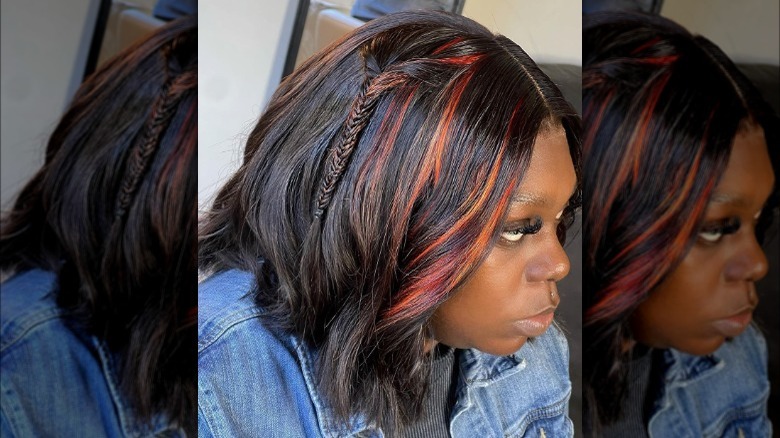 A woman with subtle red highlights