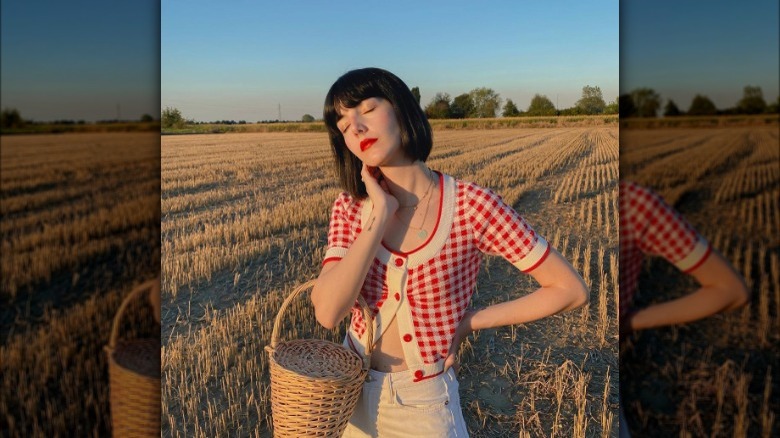 Girl holding a picnic basket