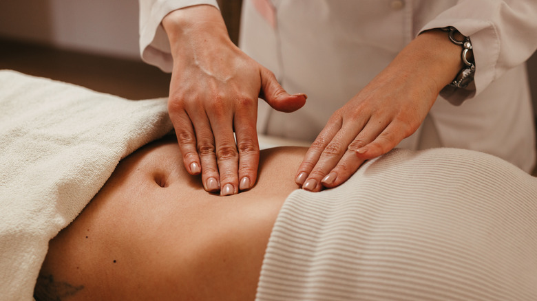 woman getting abdominal massage