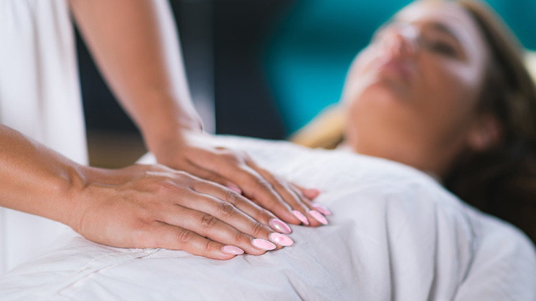 woman getting stomach massage