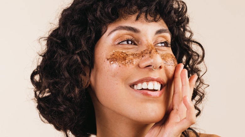 coffee scrub on woman's face