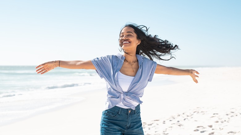 Woman happy on the beach