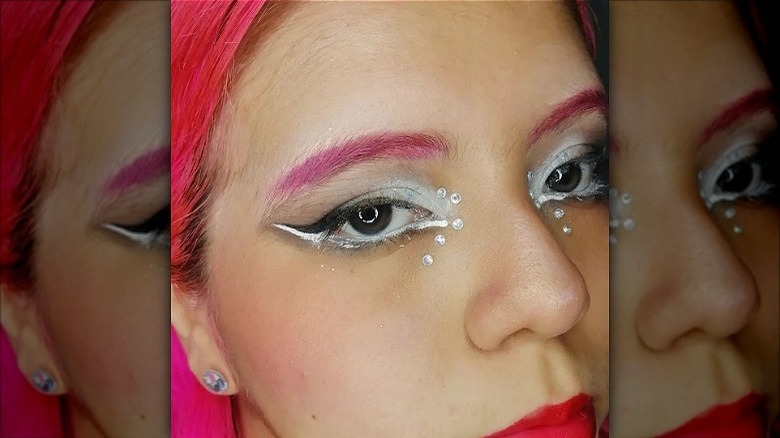 woman with bejeweled eye makeup