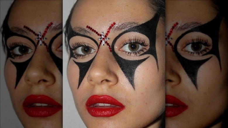 woman with bejeweled makeup