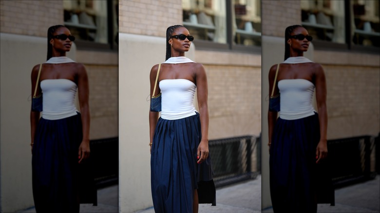 Woman wearing dark-blue skirt