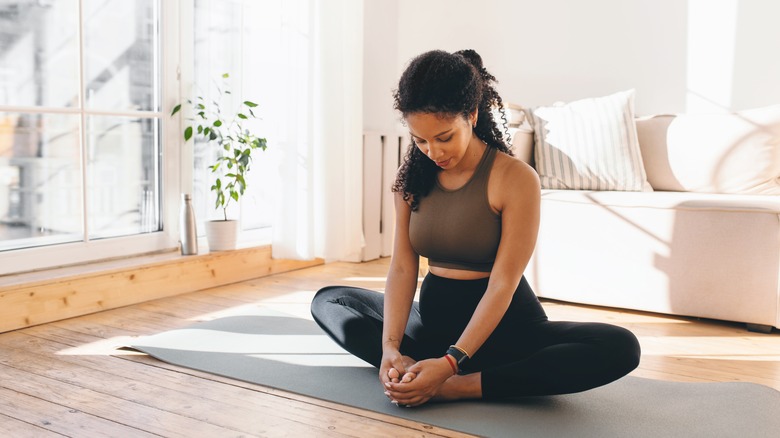 Woman doing butterfly pose