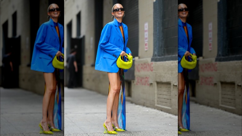 Woman wearing neon yellow heels