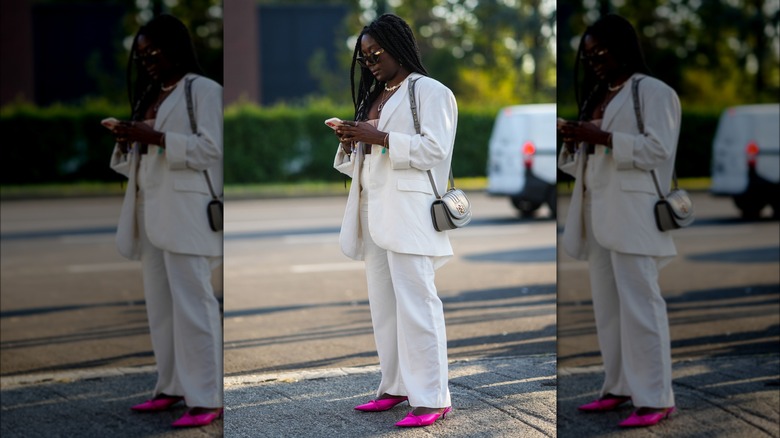 Woman wearing neon-pink heels