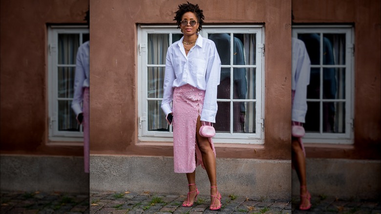 Woman wearing bright pink sandals
