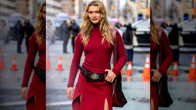 Chloe Lecareux wearing red dress and brown belt