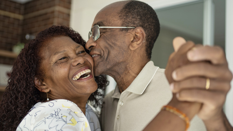 happy older couple dancing