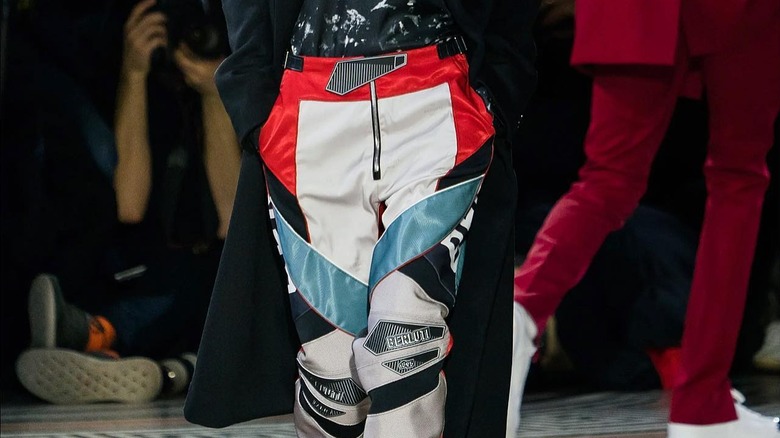 model in colorful motocross pants